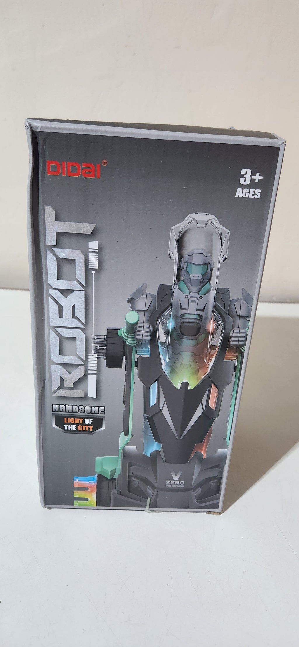 Robô de brinquedo policial com luz e som cinza